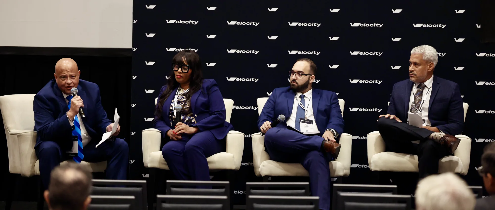 Construction and business leaders during a Velocity 2025 panel discussion